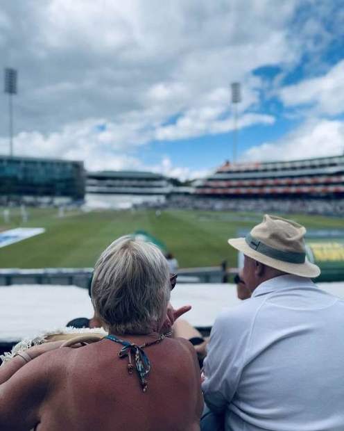 Two spectators watching the Test