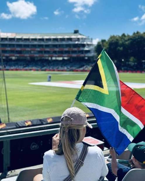 A South Africa fan with a flag