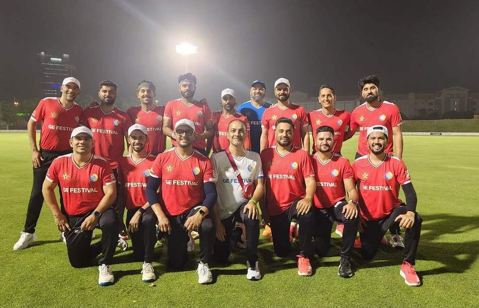 Team photo at a ground in Dubai